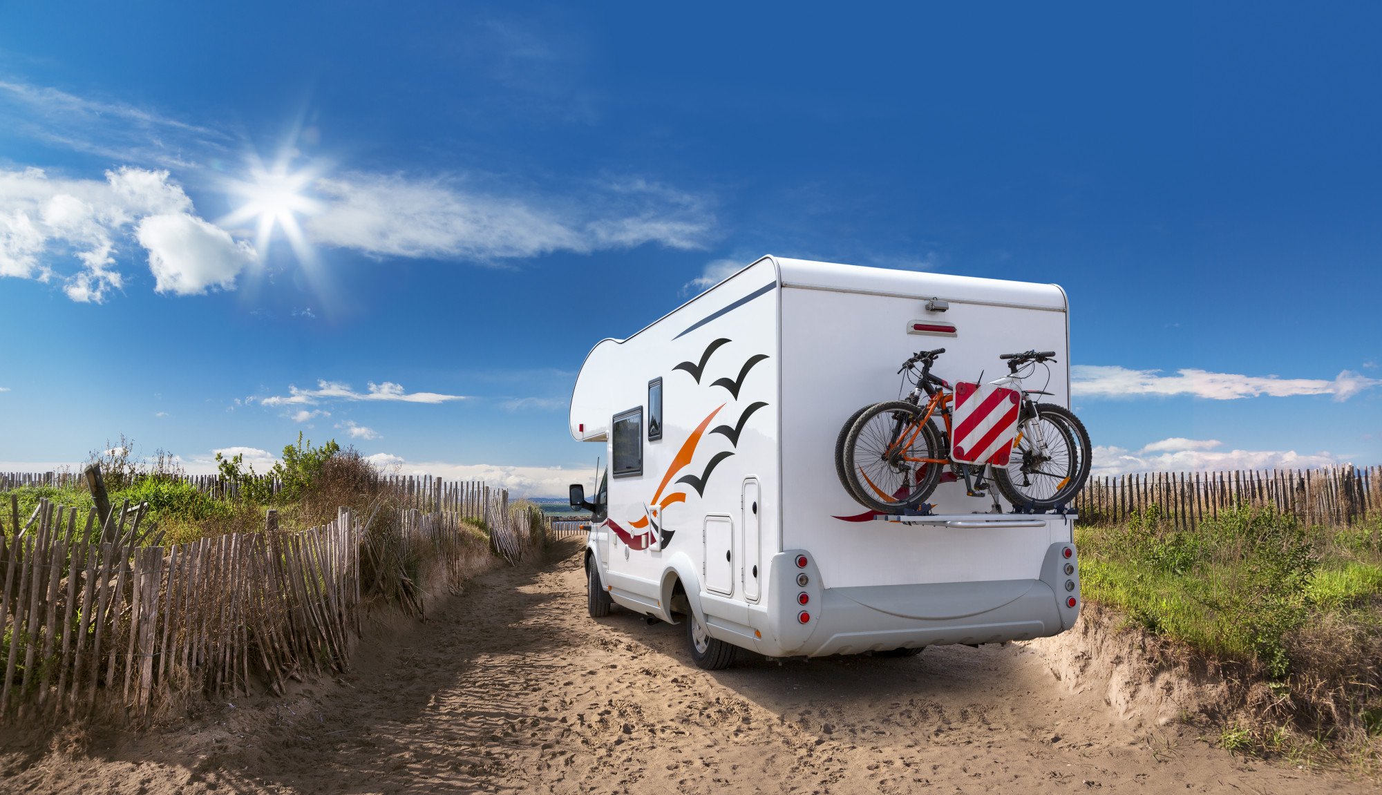 off grid camper on the beach