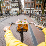 Riding a bicycle in Amsterdam