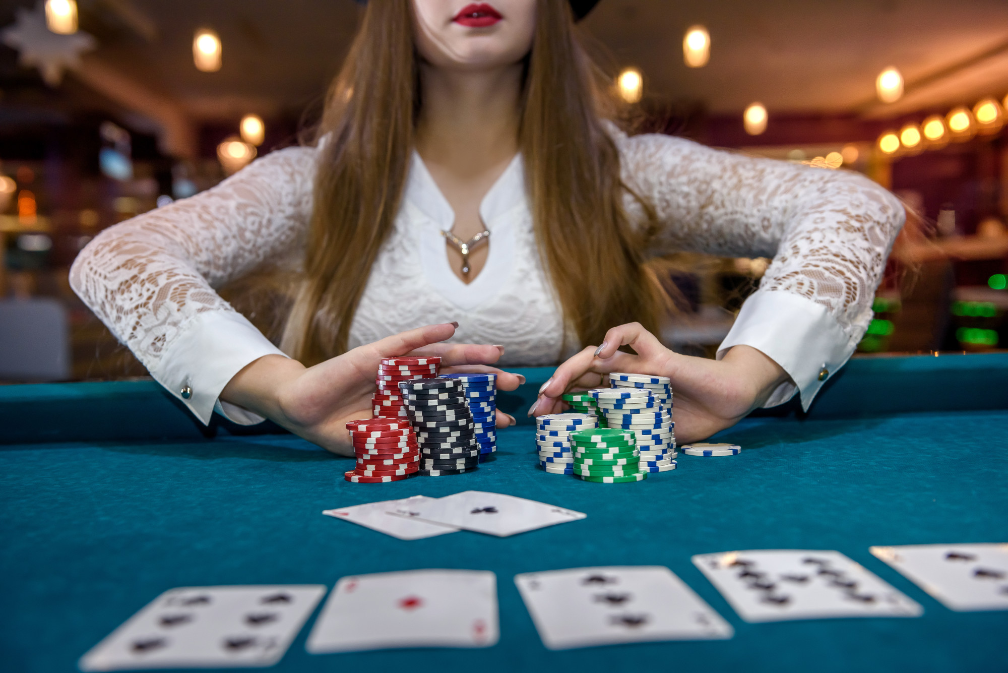woman in casino betting