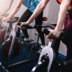people working out on bikes