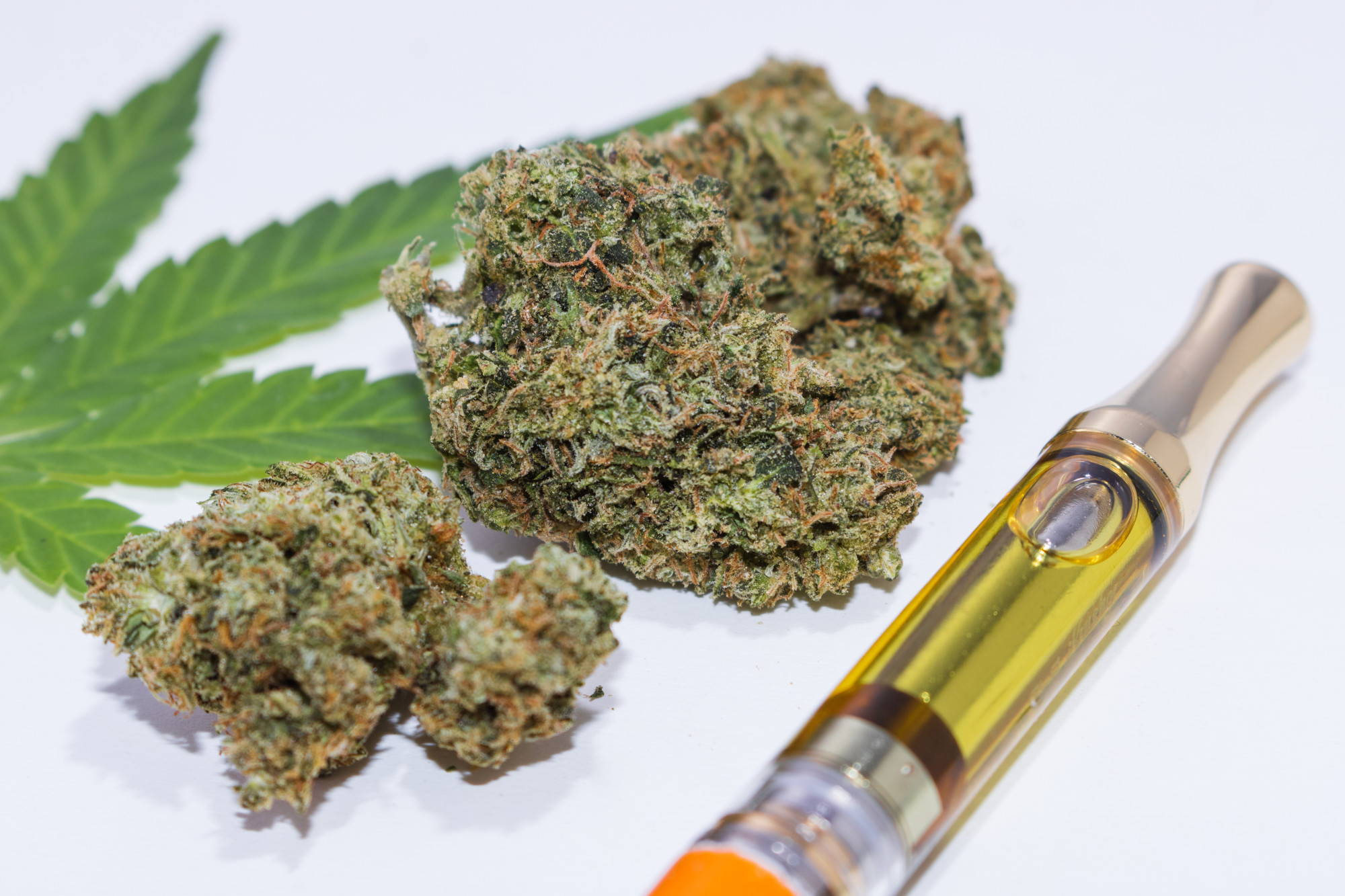 THC/CBD Concentrated Oil Vape Pen, Marijuana Buds & Cannabis Leaf On White