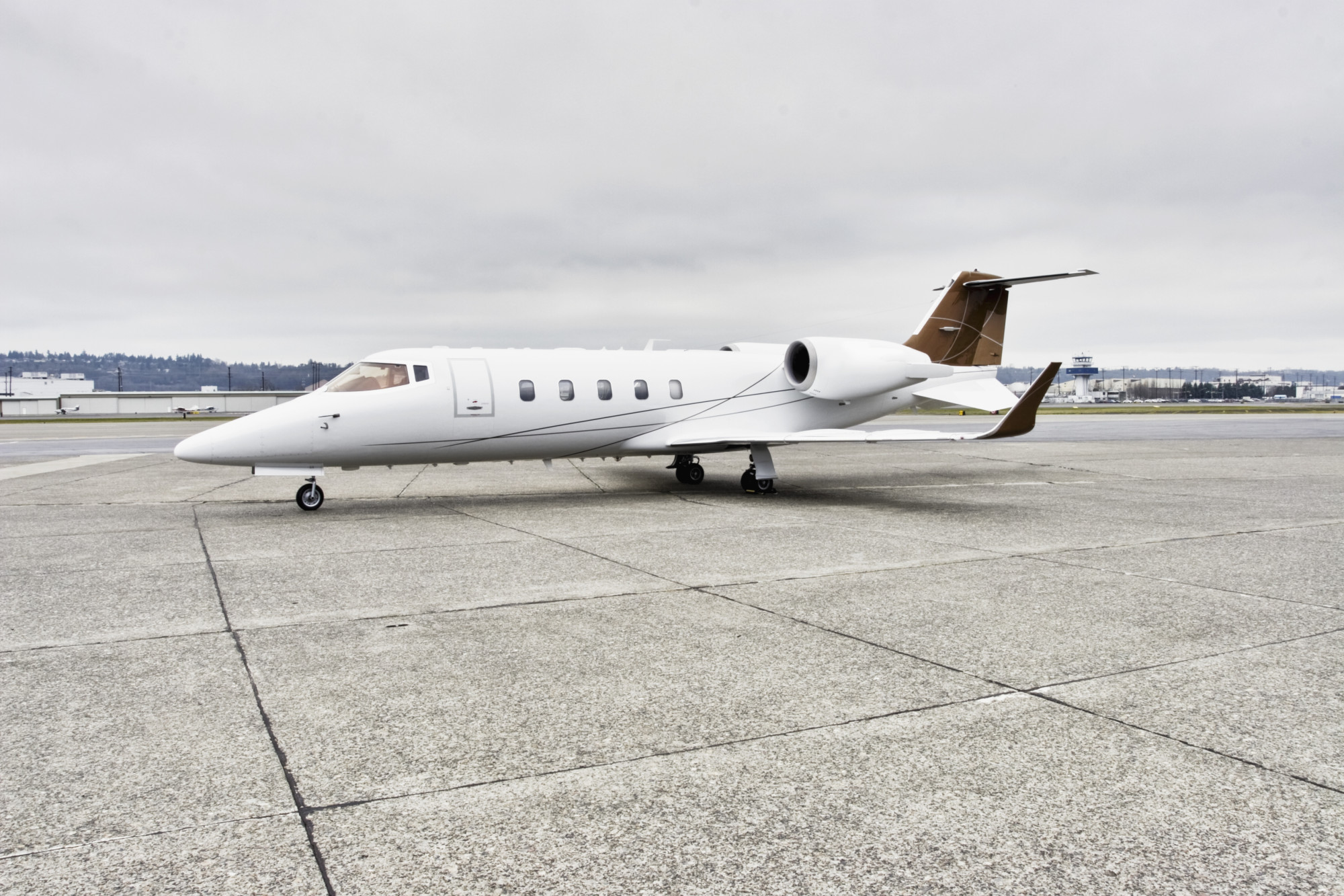 Learjet corporate aircraft profile on tarmac